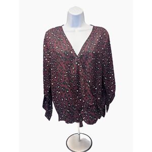 West Kei Purple and black leopard print blouse with V-neck and tie back detail